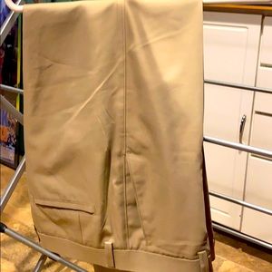 Men’s tan dress pants by Haggar.